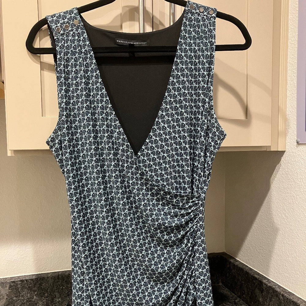 White House Black Market Green Sleeveless top in good condition.  Size M